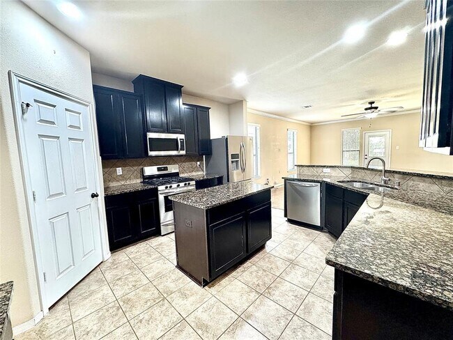 Foto del edificio - 10007 Red Tamarack Ln