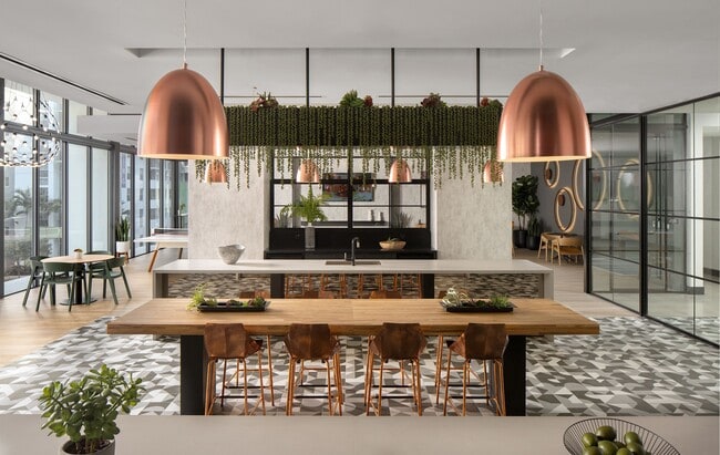 Connect and thrive in the social club lounge with chef's kitchen - Core Link at Douglas