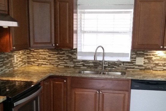 RENOVATED KITCHEN - 185 5th Ave S Apartments