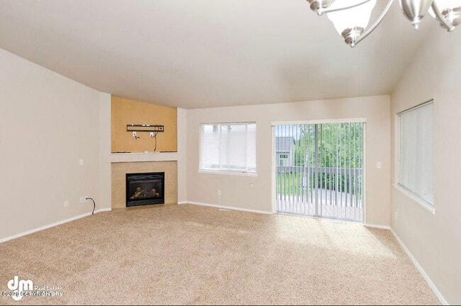 Living area with gas fireplace - 5485 S Irwin Dr