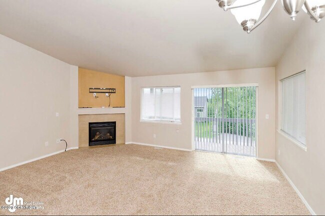 Living area with gas fireplace - 5485 S Irwin Dr
