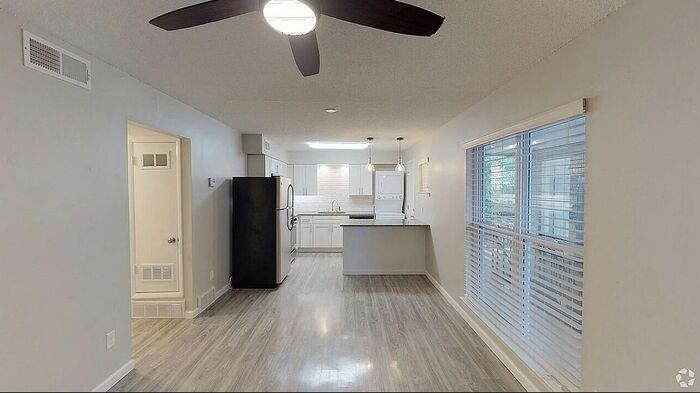 Building Photo - Your Spring Upgrade Starts at The Residence