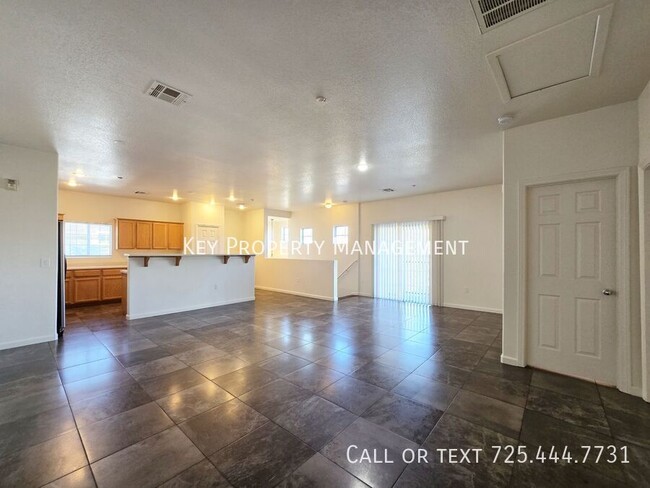 Building Photo - OPEN AND INVITING 3/BED 3/BATH TOWNHOME IN...