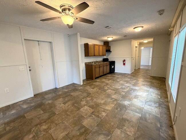 Building Photo - 2-Bed Mobile Home | Water, Trash & Lawn Care Included!