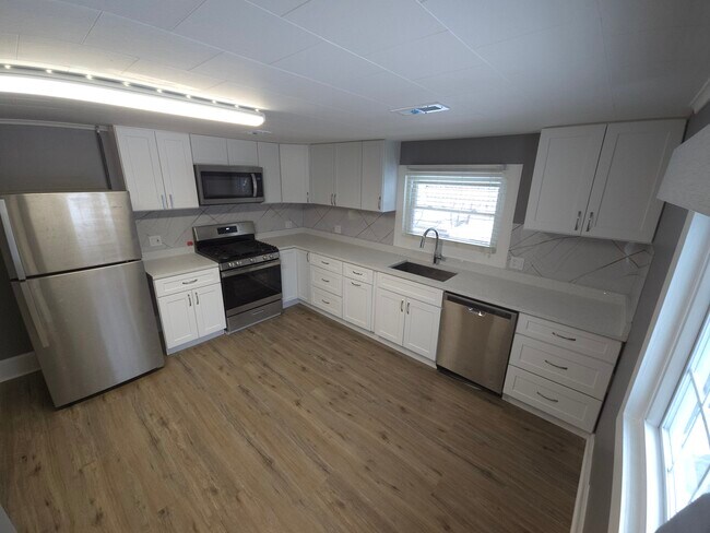 Foto del edificio - 10906 N Woodstock St