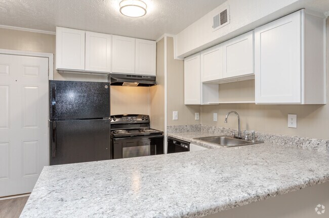2BR, 2BA - 1025SF Townhome Actualizado - Cocina - Amora East Townhomes
