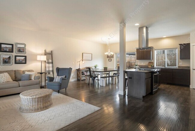 Building Photo - Spacious 4-Bedroom Home with Main Floor Pr...