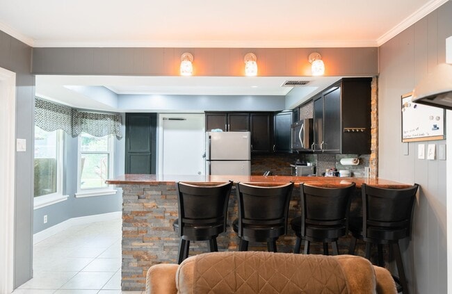Building Photo - Updated 3-Bedroom Home with Private Yard &...