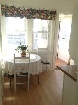 Unidad 2 - Cocina/entrada trasera $1195 - 320 E 5th St