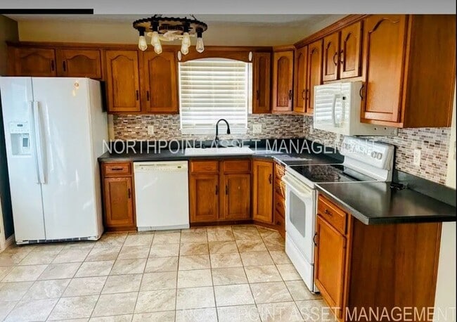 Building Photo - Eco-Friendly 4BR/3.5BA Home with Solar Pan...