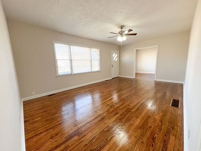 Photo - Beautiful cozy 4-side brick ranch home with just over an acre of land!