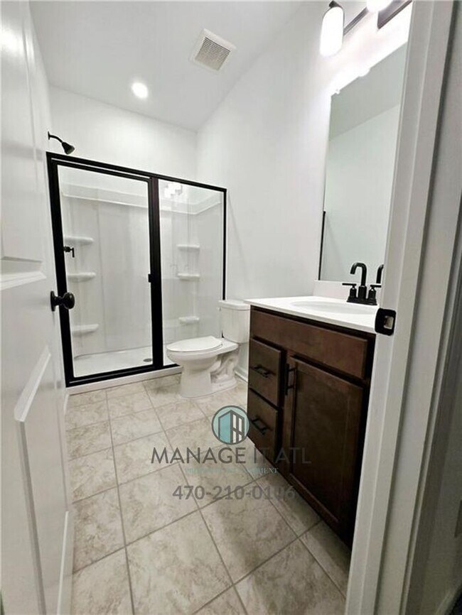 Building Photo - Beautiful End-Unit three-story townhome in Tucker