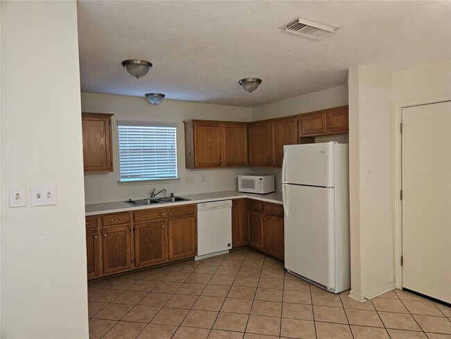 Building Photo - 11007 Kentington Oak Dr