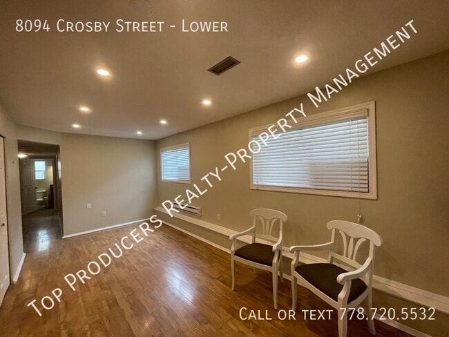 Photo du bâtiment - Bright 1 Bedroom Ground Level Suite