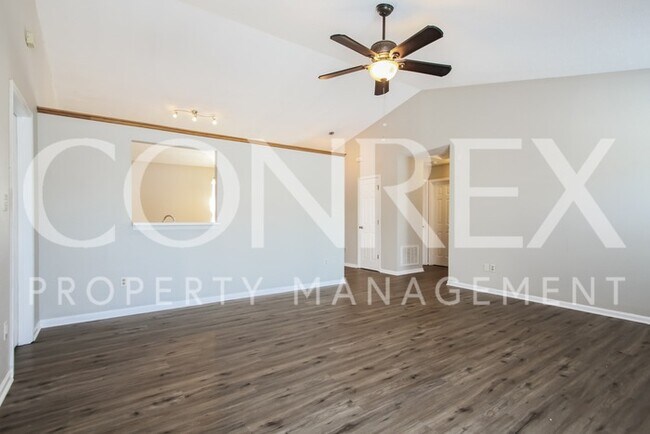 Building Photo - Lovely 3 Bedroom with Cathedral Ceilings!