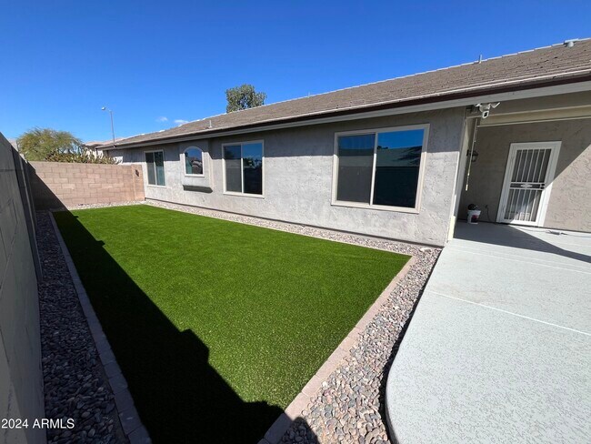 Building Photo - 6471 W Adobe Dr
