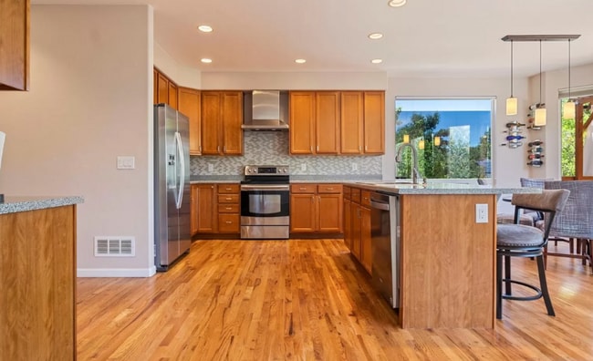 Photo - 1395 E 100th Ln House