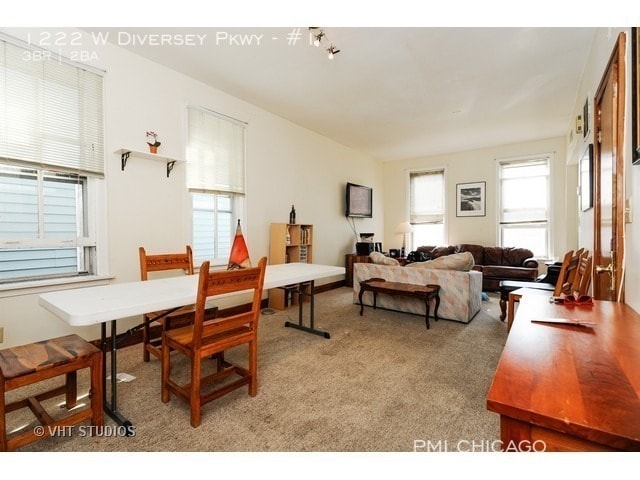 Building Photo - LOVELY unit hardwood, updated kitchen, gra...