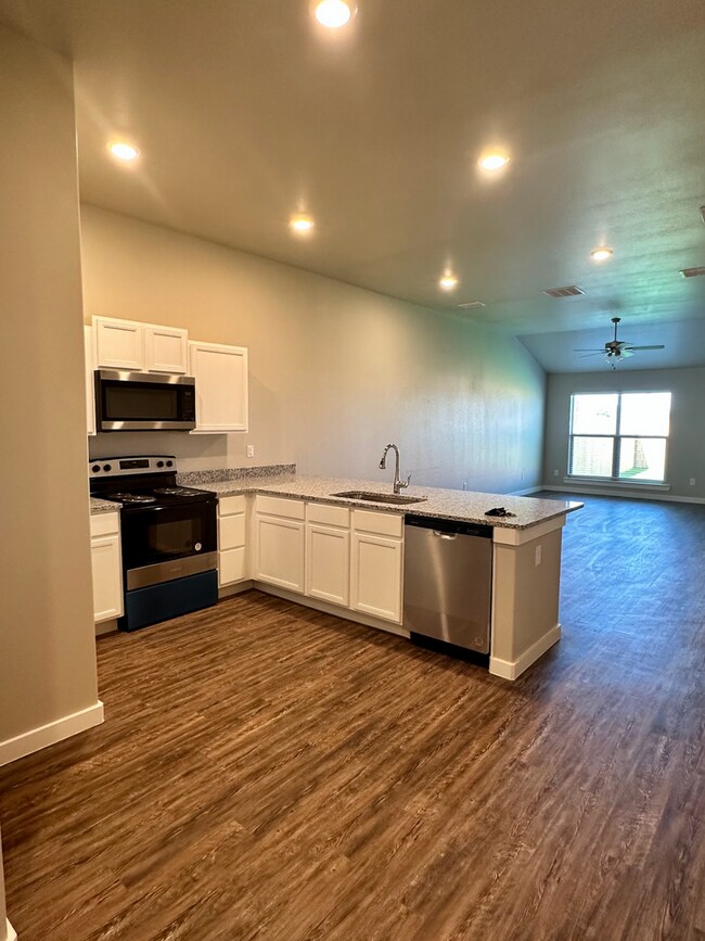 Building Photo - Stylish and Modern 3-Bedroom Duplex for Re...