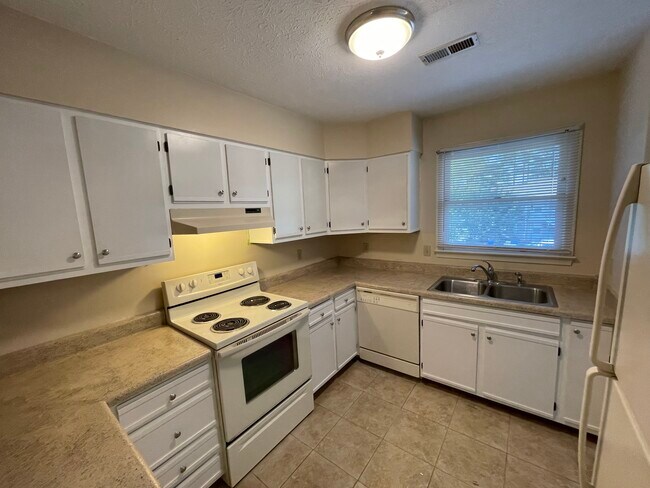 Plenty of cabinets! - 103 Meadow Park Ln