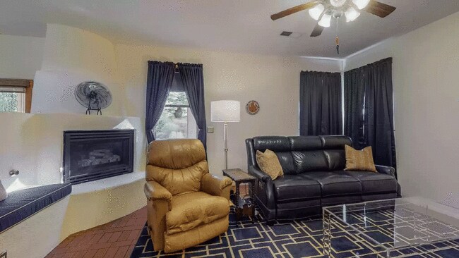 Family Room - Kiva Fireplace - 10809 Chicobush Dr NW