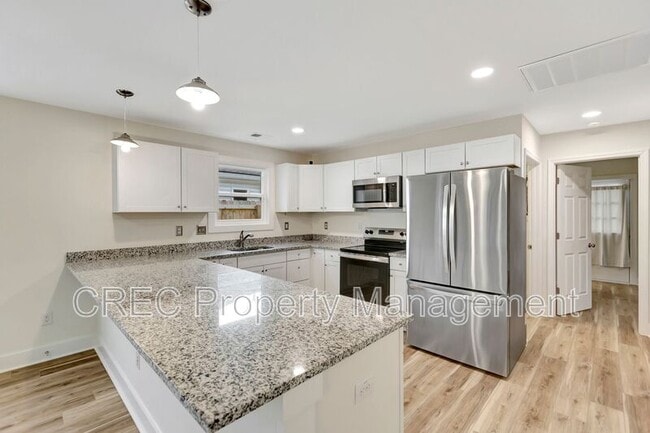 Foto del edificio - 6961 Raymond Ave