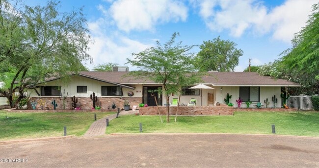 Foto del edificio - 7026 E Sunnyside Dr