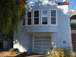Building Photo - 210 Poplar Ave