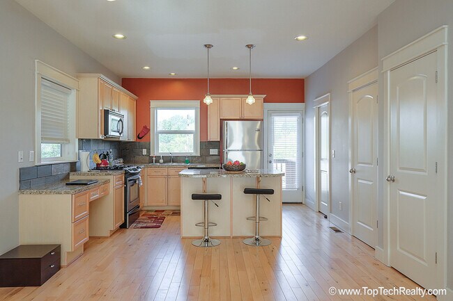 Building Photo - Duplex-style Condo with Great views of Wes...