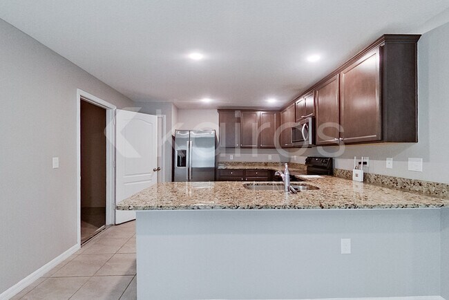 Foto del edificio - 8502 Indian Laurel Ln