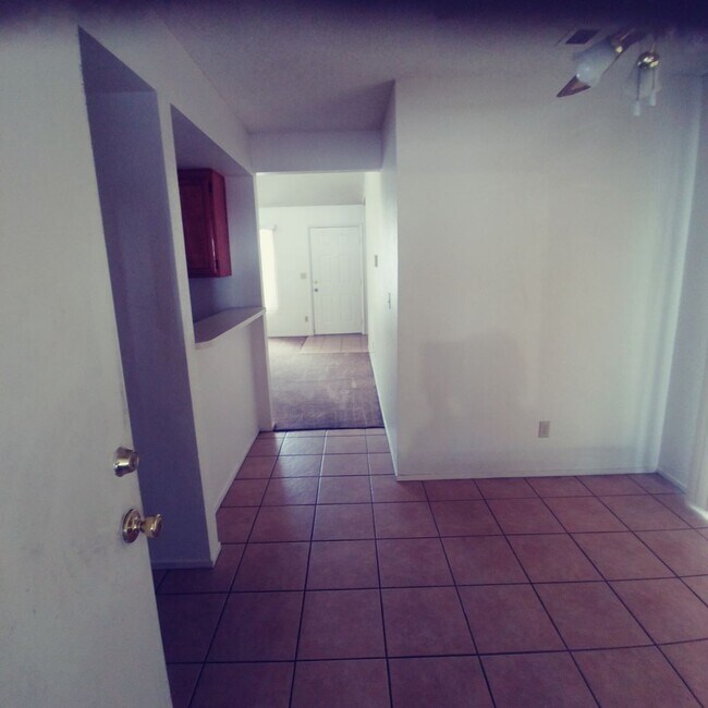 Building Photo - Single Story Townhome with 2 car attached ...