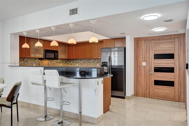 Building Photo - 16699 Collins Ave