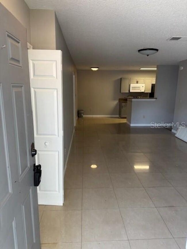 Building Photo - First-Floor 2-Bed, 2-Bath Condo Near Unive...