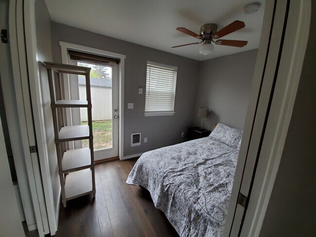 Bedroom semi-furnished. - 6117 SE Steele St
