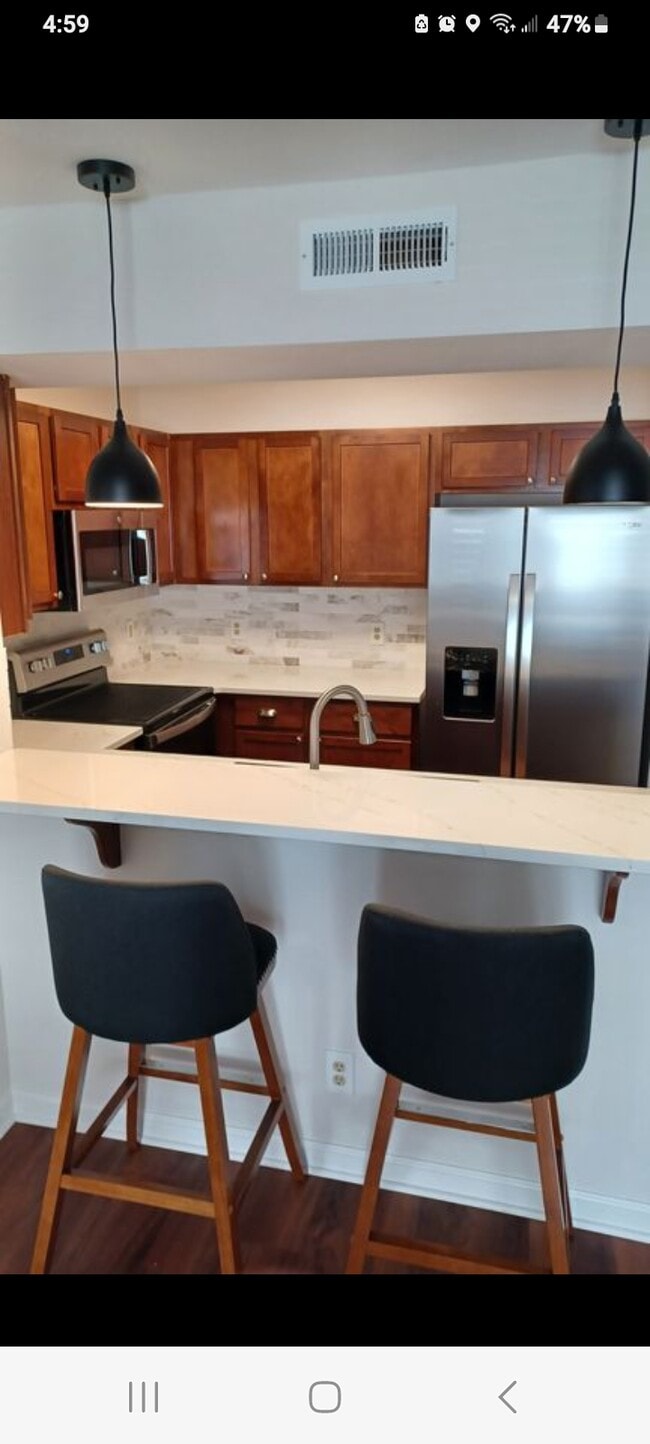 Newly upgraded quartz countertops stainless steel appliances have a seat at this comfortable break b - 155 Morningside Ln