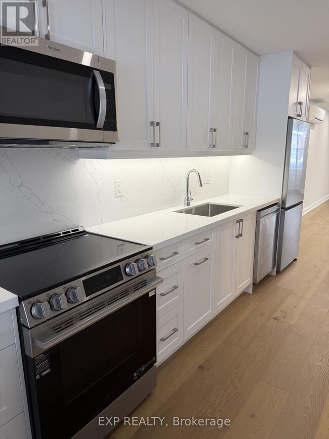 Photo du bâtiment - 875 Millwood Rd