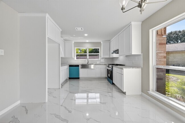 Foto del edificio - 10603 Highland Woods Dr