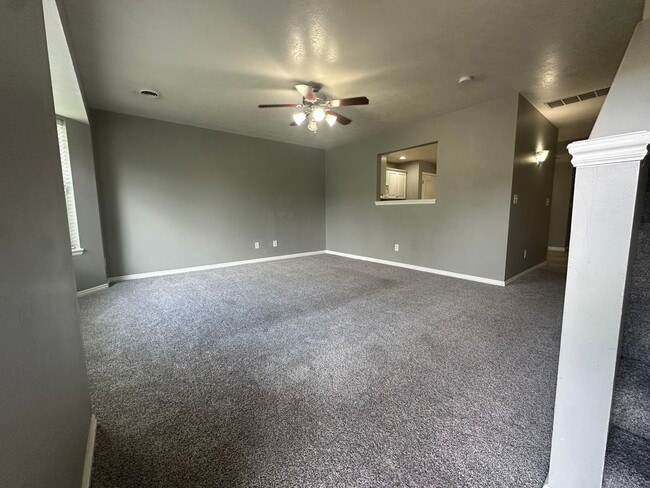 Building Photo - 2-Bedroom Townhome with Central AC and Covered Parking