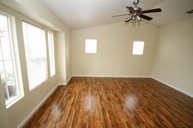 Building Photo - 4 Bed| 2.5 Bath | 2061 SF | 2 Car Garage | Long driveway with gate | Tenant pays $175 monthly for...