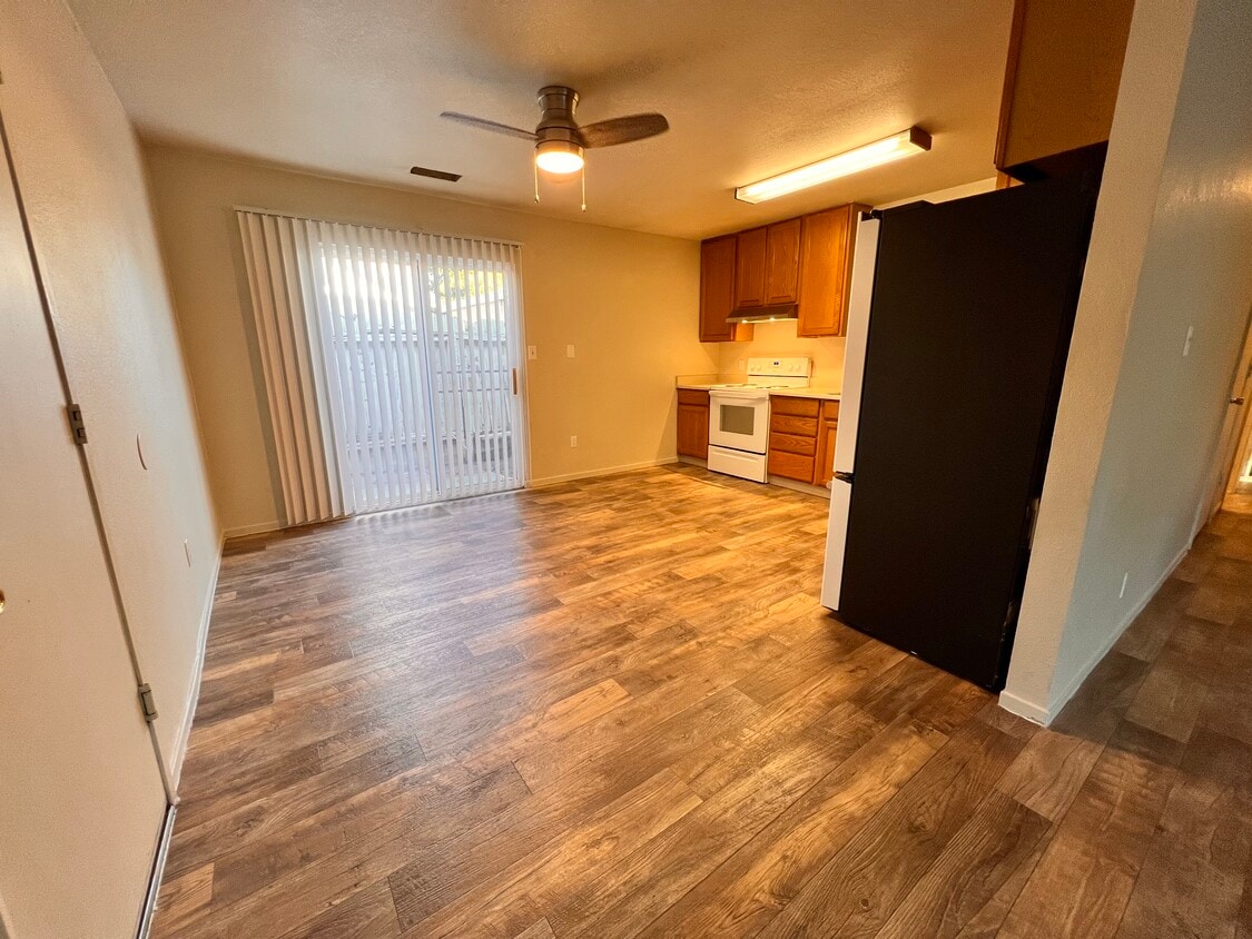 Kitchen with slider to backyard & ceiling fan - 5026 Dana Ave