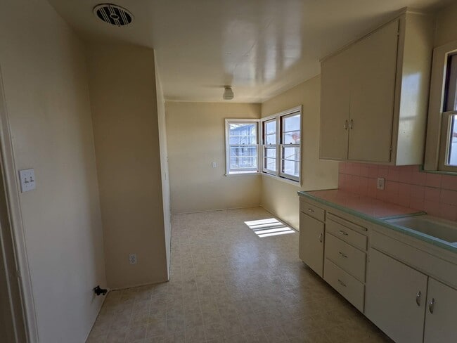 Kitchen, Dining area - 4045 E 8th St
