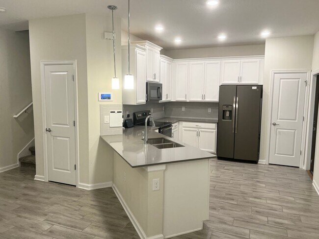 Photo - Incredible 5 Bedroom, 3 Bath Town home wit...