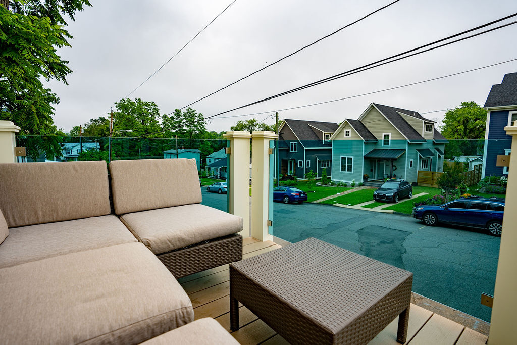 top floor balcony with sofa - 610 Montrose Avenue Apt B