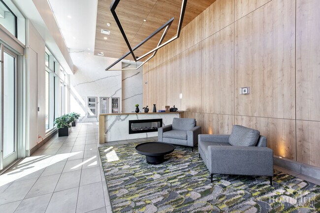 Photo du bâtiment - Exceptional Corner 2-Bedroom Residence in the Heart of King George Hub – Unobstructed City Views!