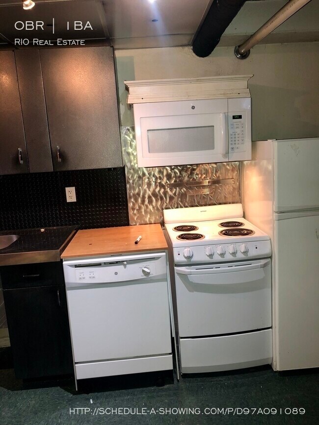 Foto del edificio - Amazing Garden Level Studio Unit in Uptown!!