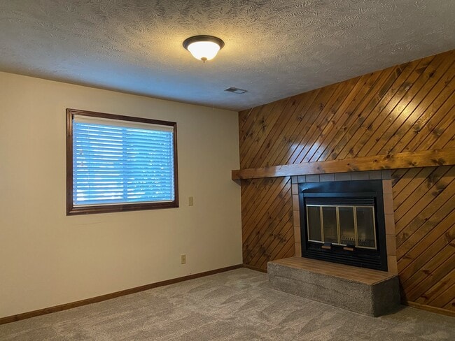 Finished basement with fireplace - 13835 Greenfield Rd