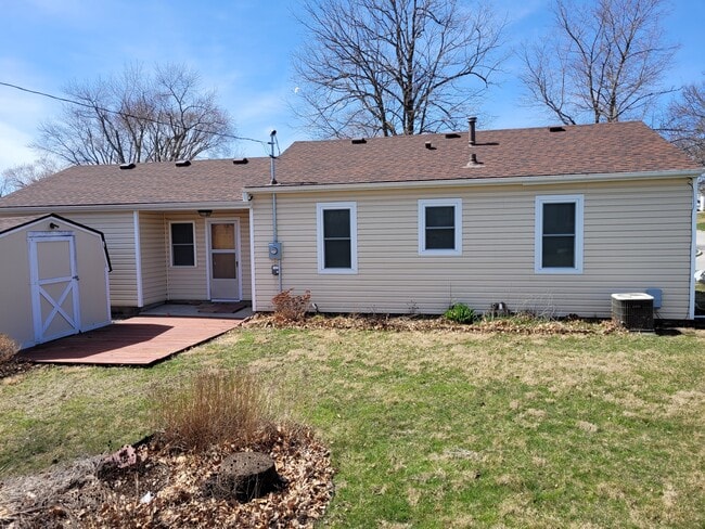 Rear of house with shed - 128 E 17th St N