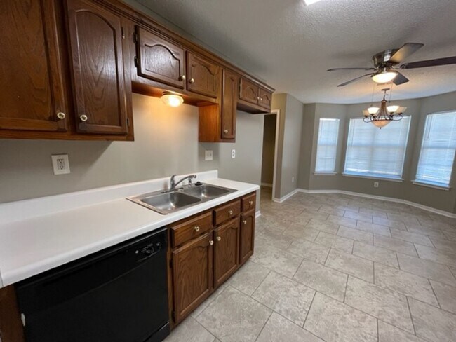 Building Photo - Renovated 4 Bedroom 2 Bath Home with 2 Car...