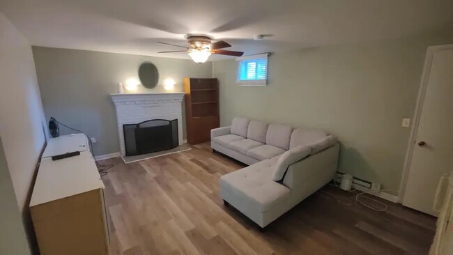 Living room is fully furnished - 8702 49th Ave