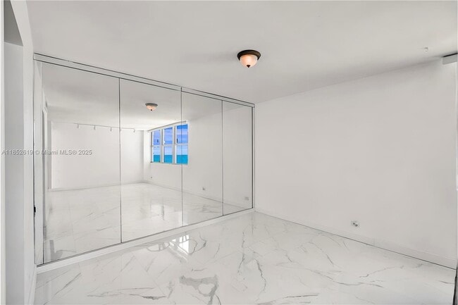 Building Photo - 5055 Collins Ave